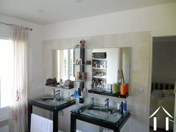 To give some idea of the modern styling; this is the bathroom area of the downstairs bedroom. Not shown is the large walk-in shower and the separate dressing room.