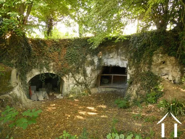 The surprise: two of the three cave workings located in the grounds. One of these is used as the wine cellar !