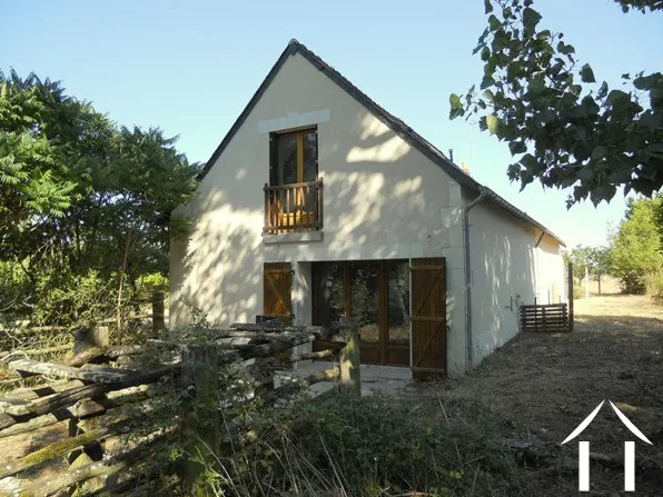 This shows the far end of the property. Double French windows lead off a large sejour. Upstairs is the master ensuite bedroom.