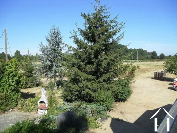 Views of the courtyard with the piggeries (on the right) and barn beyond. The piggeries have been converted to house both the central heating boiler (new) and oil tanks and also provide a large laundry room area.