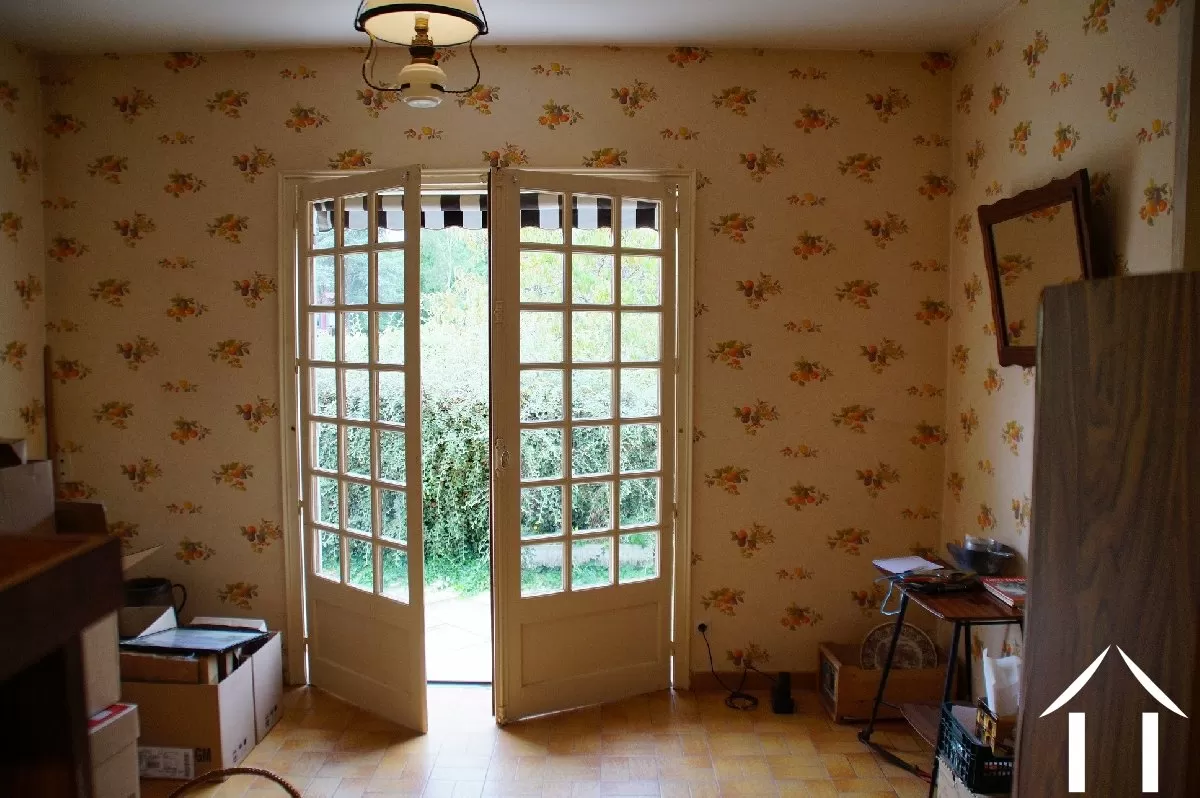 Doors opening to the garden from kitchen