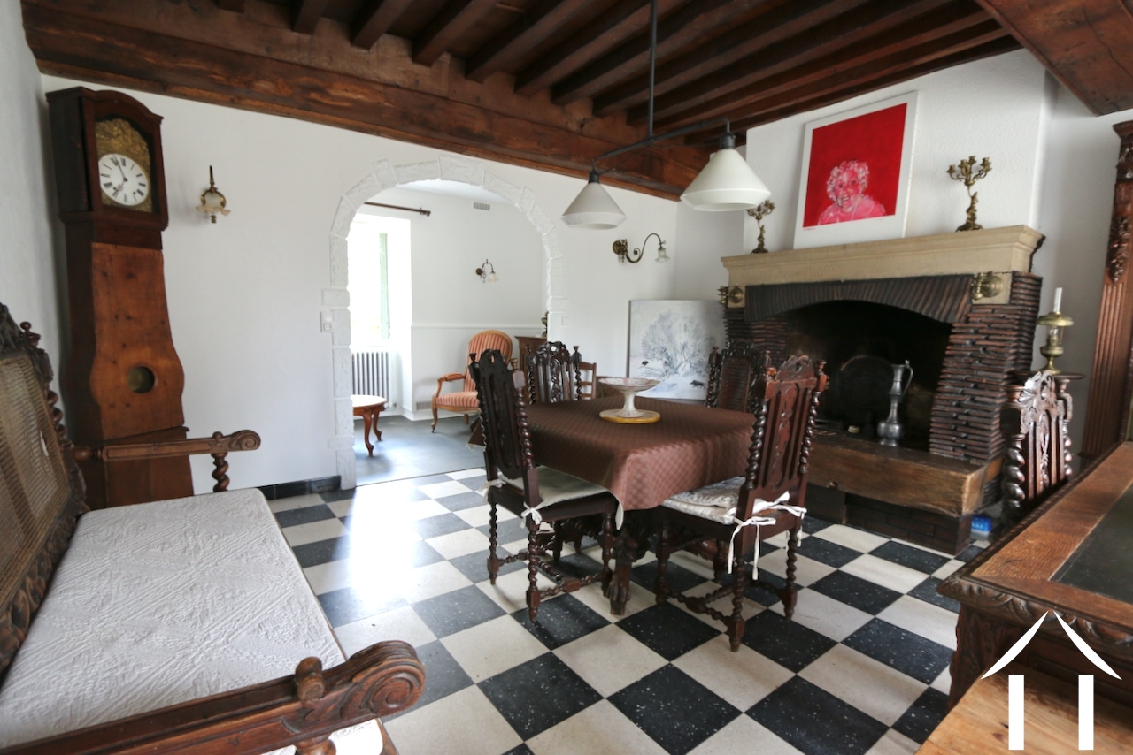 Haus 1: Wohnzimmer mit Lesezimmer im hinteren Bereich