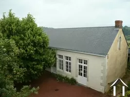 Shows the smaller house, which is currently used as a consulting room but would easily turn back into a maison d'amis.