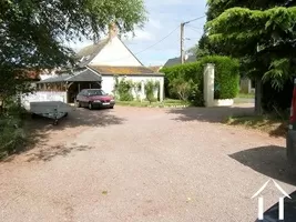 This shows one end of the property with the entrance and courtyard.