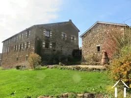 Impressive main building and annexe from the garden