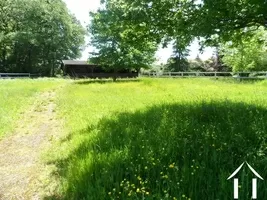 paddock with hay barn