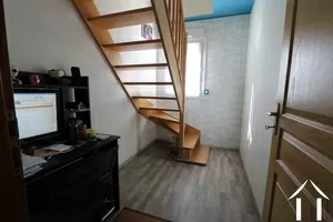 office/study with stairs to the first floor