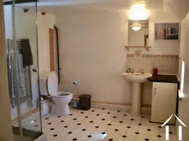 bathroom with toilet upsatirs