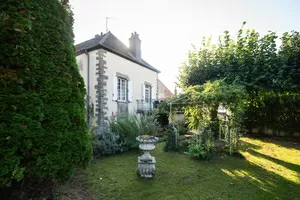 Der Garten, die Terrasse und das Haus