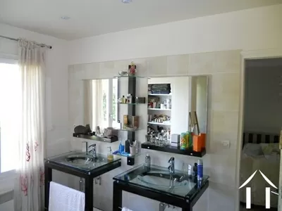 To give some idea of the modern styling; this is the bathroom area of the downstairs bedroom. Not shown is the large walk-in shower and the separate dressing room.
