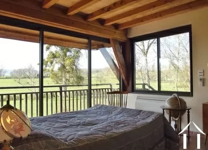 bedroom 1 with balcony and views