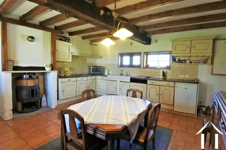 Fitted kitchen with dining area