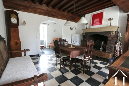 Haus 1: Wohnzimmer mit Lesezimmer im hinteren Bereich