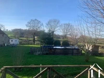 Vue arrière maison piscine hors sol